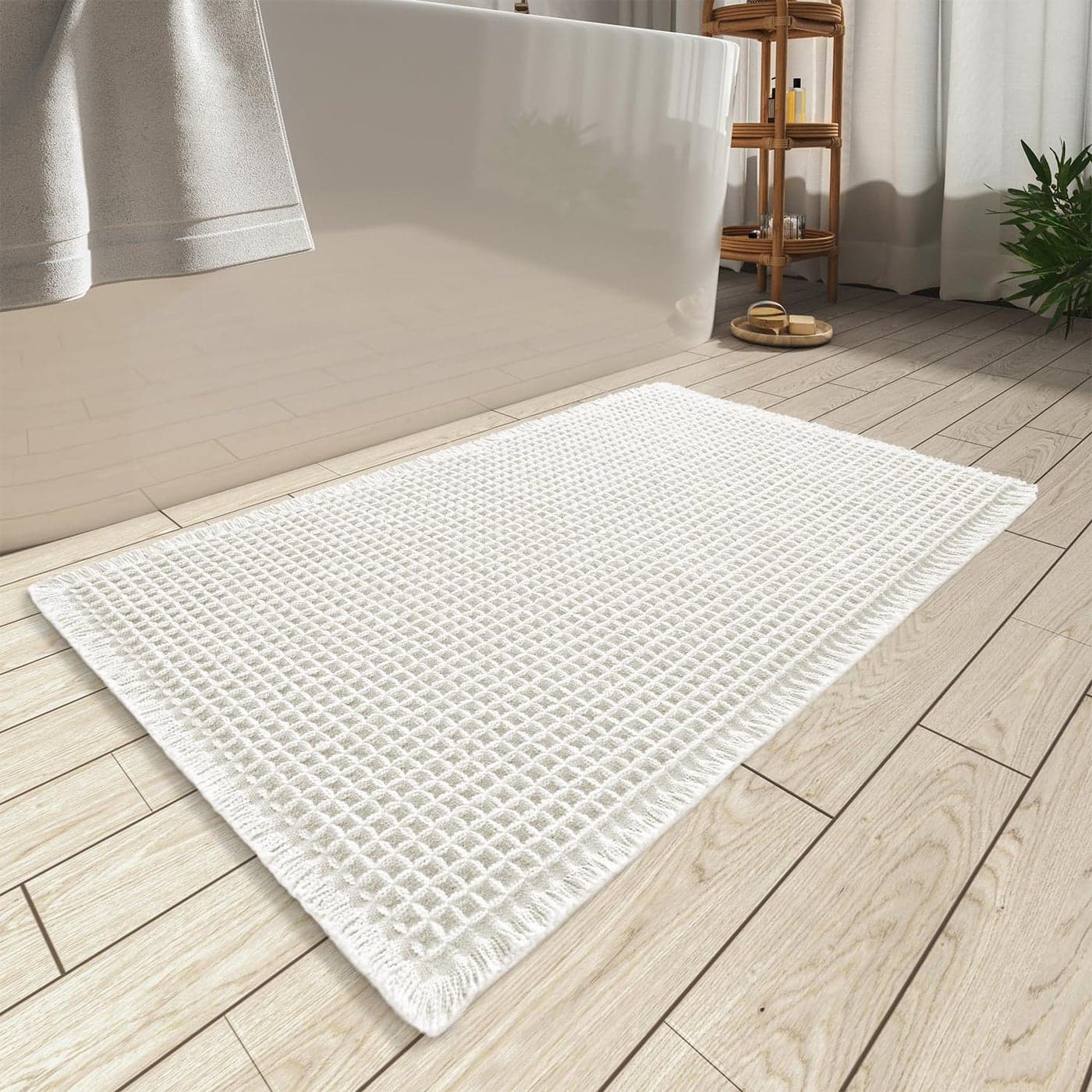 AMOAMI Upgraded Waffle Bath Mat Super Absorbent Non Slip Bath Mats for Bathroom Floor Machine Washable Bathroom Rugs with Tassels Rubber Backed Bathroom Mats Ultra Soft 17 x 24 White
