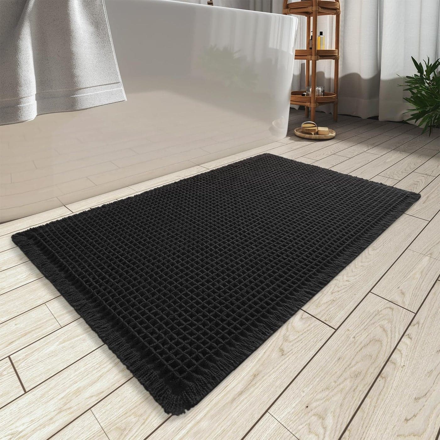 AMOAMI Upgraded Waffle Bath Mat Super Absorbent Non Slip Bath Mats for Bathroom Floor Machine Washable Bathroom Rugs with Tassels Rubber Backed Bathroom Mats Ultra Soft 17 x 24 Black