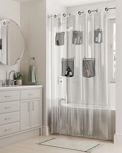 Rubbermaid Clear No Hook 3-in-1 Waterproof Shower Curtain with 5 Storage Pockets, Heavyweight PEVA Instacurtain for Bathroom with Black Built-in Rustproof Rings, 71” x 74”, Clear