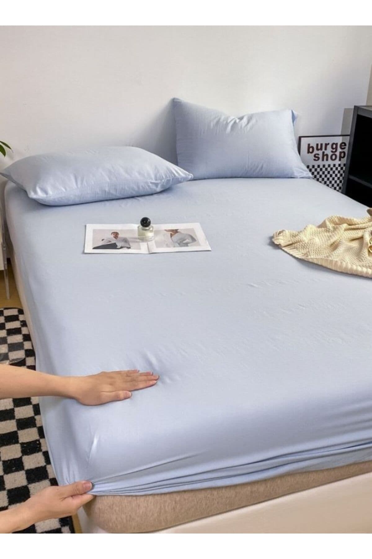 3-Piece Includes a single-size fitted bedsheet and two pillowcases, washable cotton in a blue color.