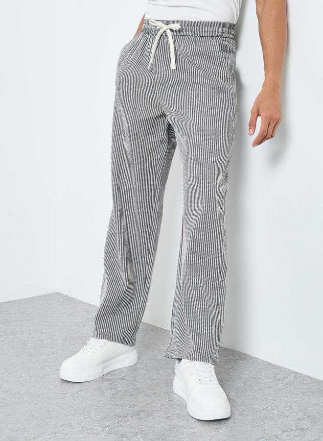 Styli Men Grey Striped Oversized Joggers with Contrast Drawcord