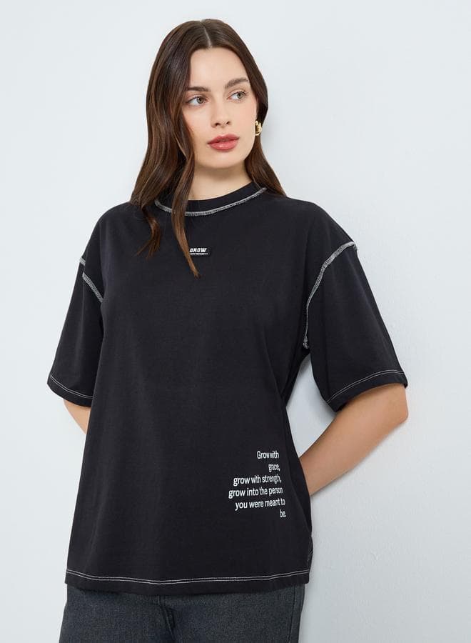 Women Black Oversized Graphic Slogan T-Shirt — L