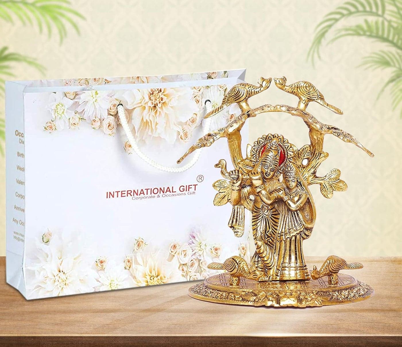 INTERNATIONAL GIFT Gold Plated Radha Krishna Tree Stand God Idol Statue Oxidized Finish with Beautiful Red Velvet Box and with Carry Bag 20H x 16W x 14L Centimeters