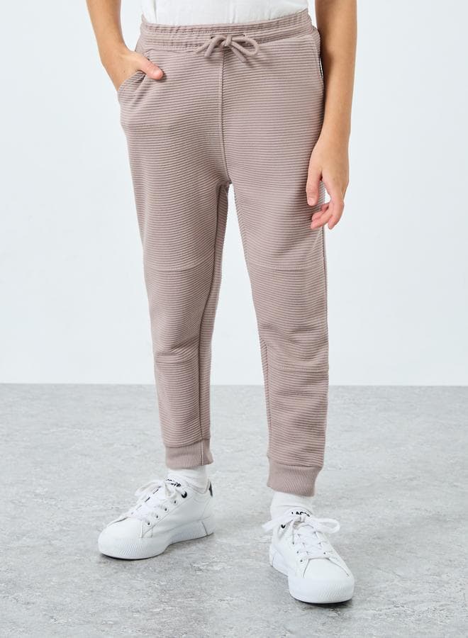 Boys Beige Textured Ottoman Joggers
