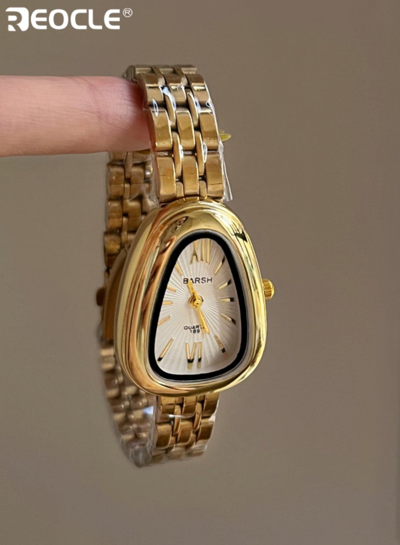 Women's Asymmetrical Shaped Wristwatch with Metal Link Strap Sunray Dial & Roman Numeral Markings Quartz Movement Timepiece for Daily Wear & Stylish Accessorizing