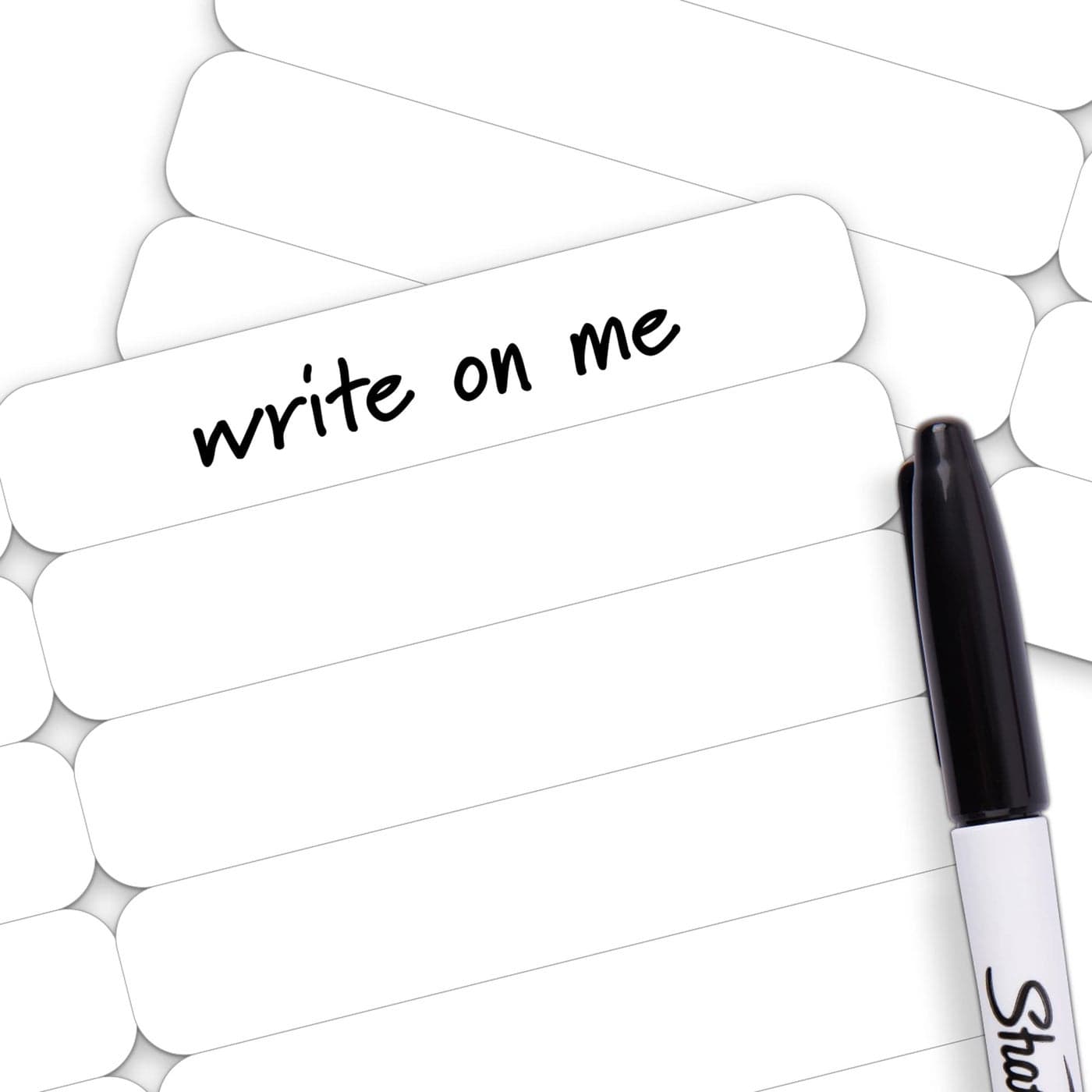 Label Land 100 pcs Writable Iron on Name Tags for Clothing with Permanent Laundry Marker Clothing Labels for Nursing Home Daycare Custom Fabric Labels for Clothes Washable Precut 2x038