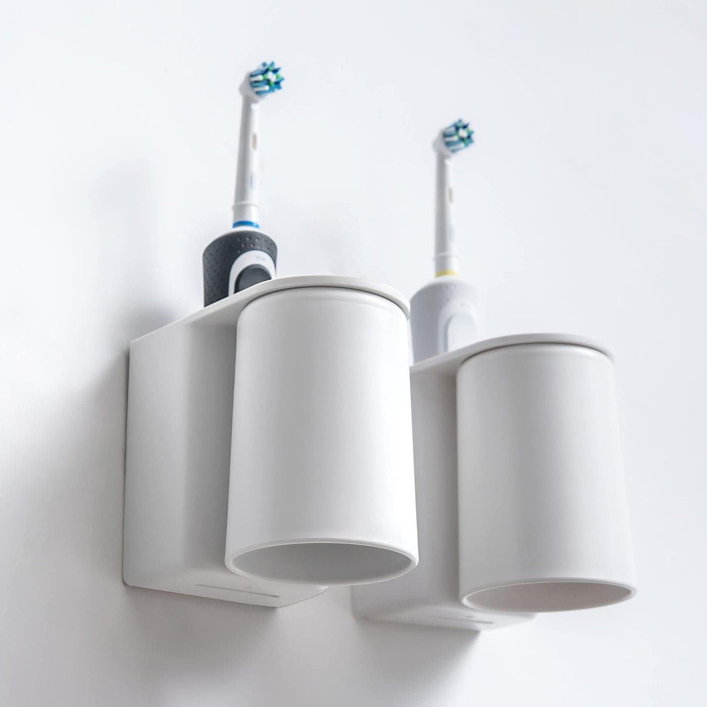 FLAUVEL WallMounted Toothbrush and Toothpaste Holder SelfDraining Design Easy Installation SpaceSaving White Single One Magnetic Cup