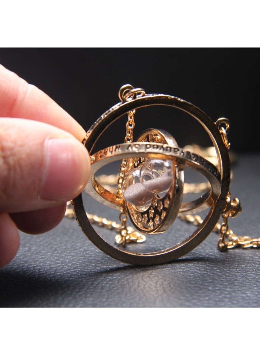 Rotating Hourglass Pendant Necklace Vintage-Inspired Gold-Tone Time Turner Design with Moving Sand Unique Statement Jewelry for Fans and Collectors