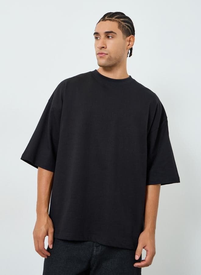 Men Black Boxy Fit Embossed Print T-Shirt