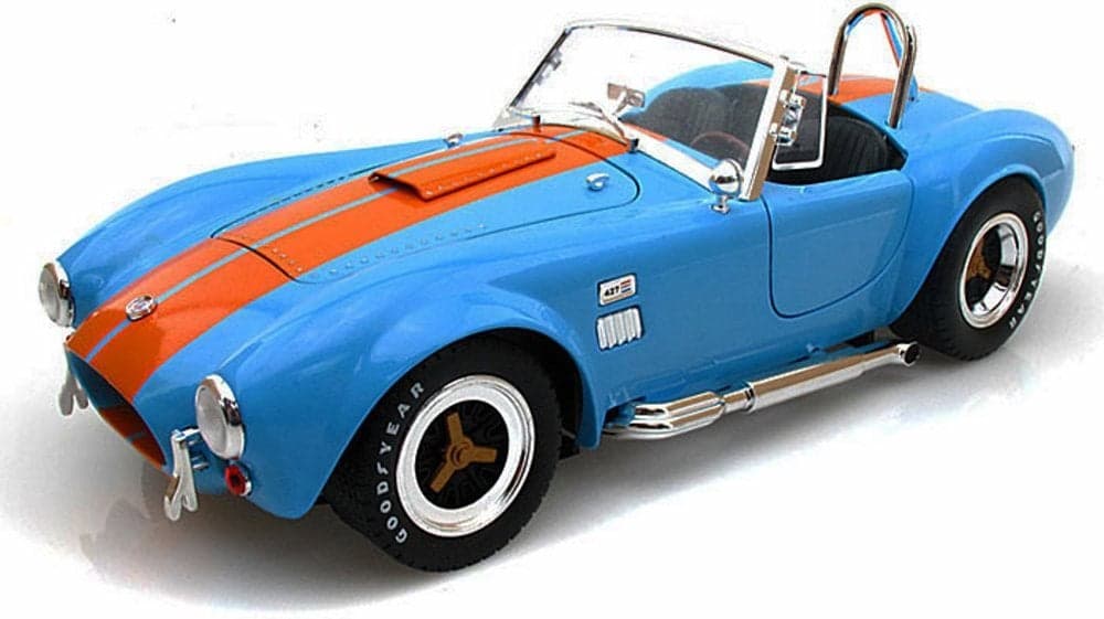 Shelby Collectibles 1965 Shelby Cobra 427 SC Blue with Orange Stripes 118 Diecast Model Car