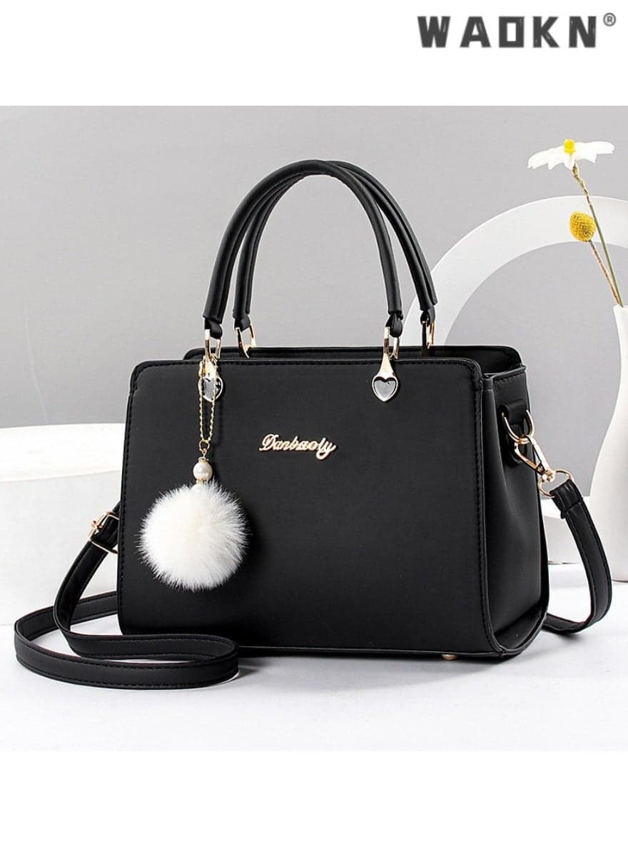 Trendy female double-layer large-capacity fur ball decorated handbag and crossbody bag, unique design showcasing individual charm, essential fashionable accessory for travel(Black )