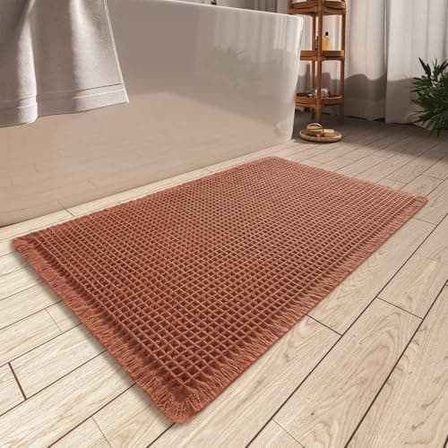AMOAMI Upgraded Waffle Bath Mat Super Absorbent Non Slip Bath Mats for Bathroom Floor Machine Washable Bathroom Rugs with Tassels Rubber Backed Bathroom Mats Ultra Soft 17 x 24 Dirty Orange