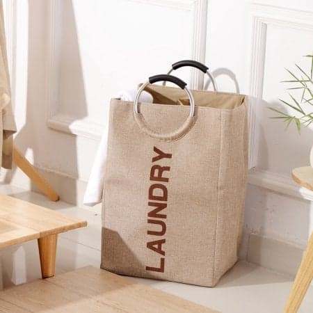 HOMIES INTERNATIONAL Multipurpose, Foldable Soft grip Aluminium handle square shape Jute Laundry Hamper Basket bag (30x32x58 cm, Available in Beige and Brown color, will be send as per availability)