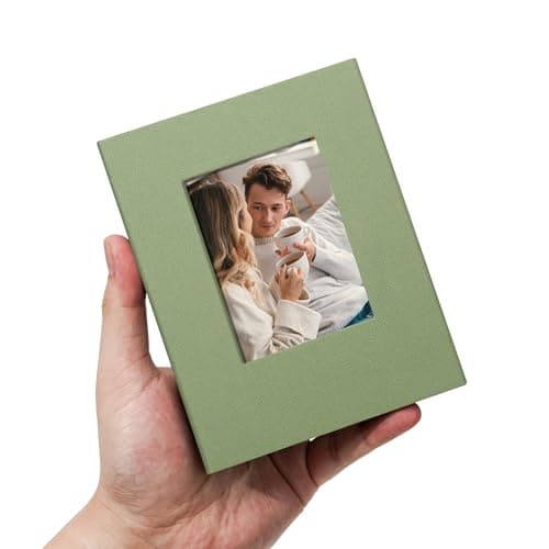 Remowith Small 4x6 Photo Album 100 Pockets Linen Cover with Front Window Portable Mini Picture Book for Family Travel Wedding and Memory Keepsake Organizer Light Green