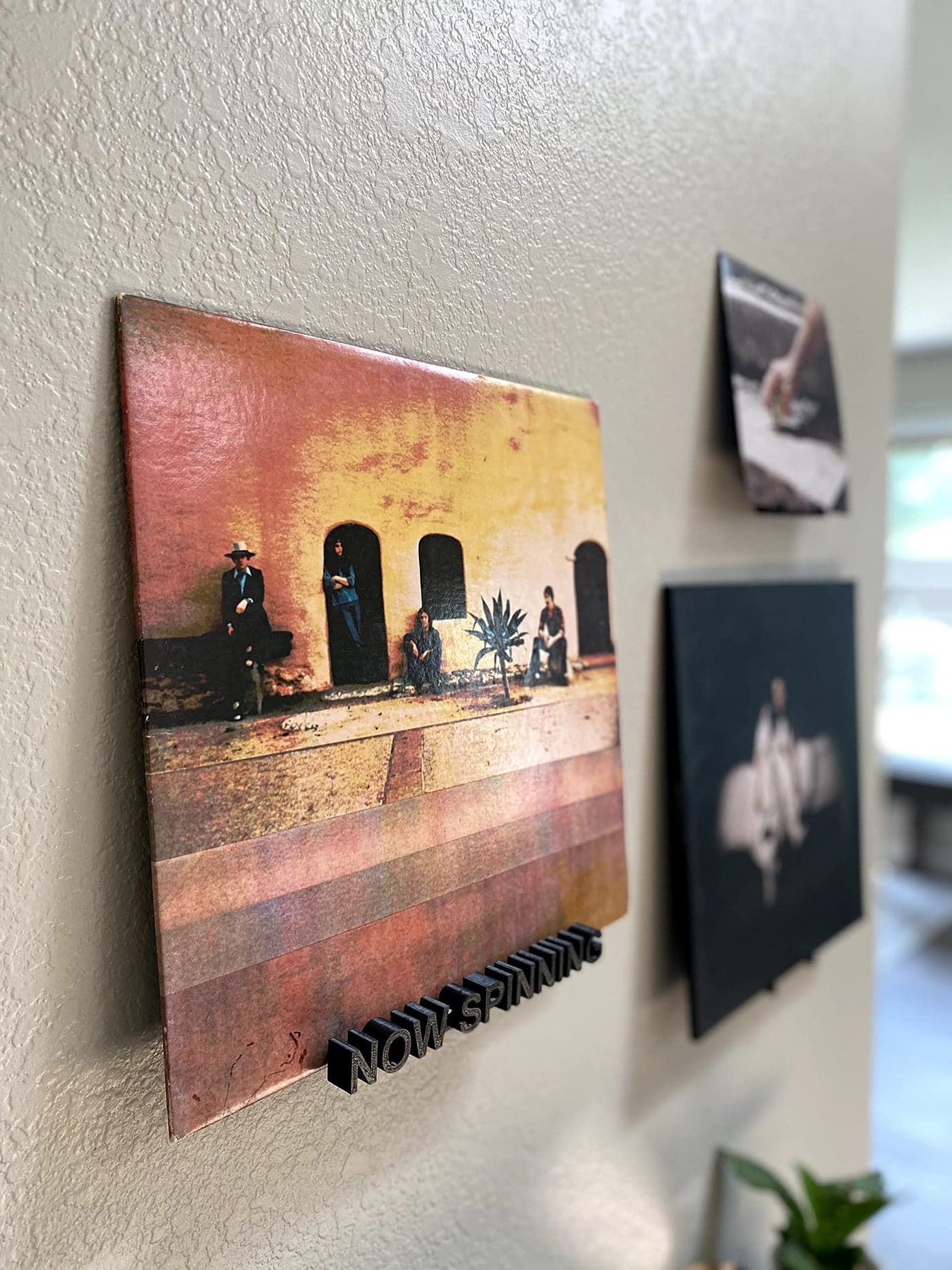 Now Spinning Vinyl Record Wall Mount Display/Shelf | Hang Albums Without Wall-Damage | Perfect for Office, Home, Dorms, and Apartments (Now Spinning + 2 Mounts, Black)