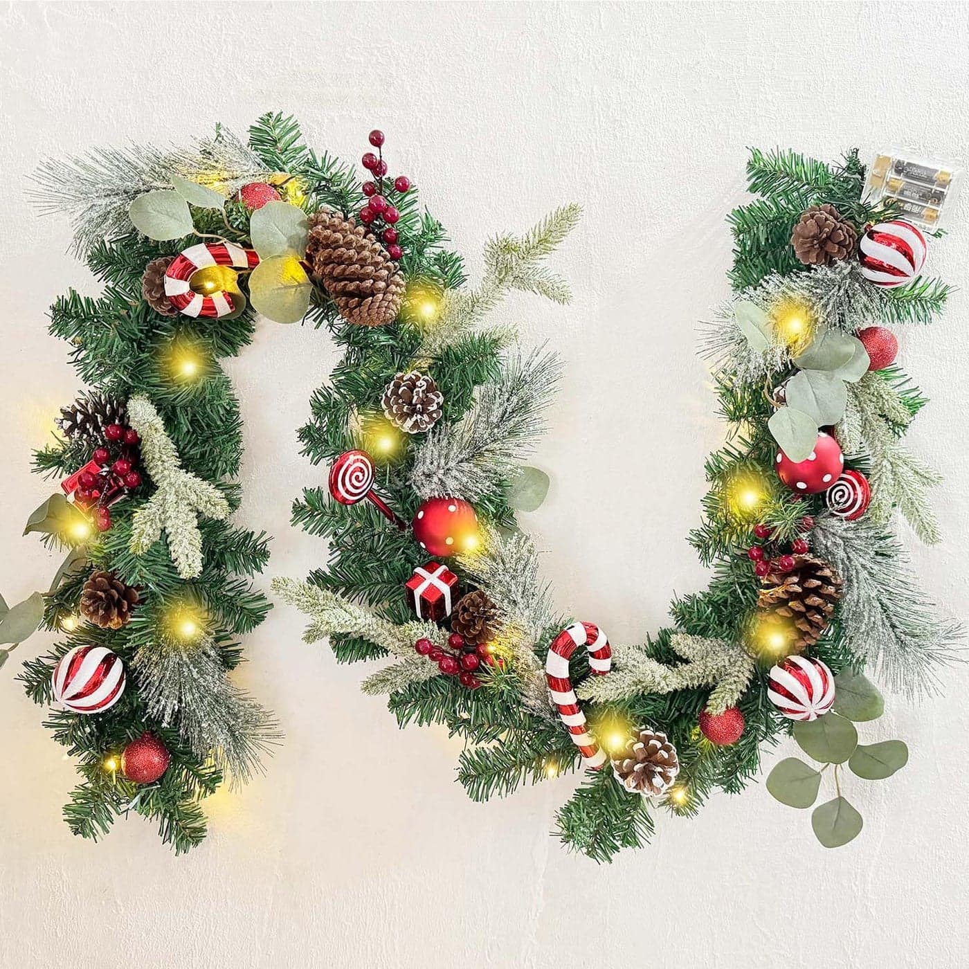 WANNACUL PreLit 6 Feet 72 Inch Christmas Garland with Lights for Front Door Red White Christmas Mantel Garland Decoration with Ball OrnamentsCandy CanesEucalyptus Leaves Battery Operated 30 LED