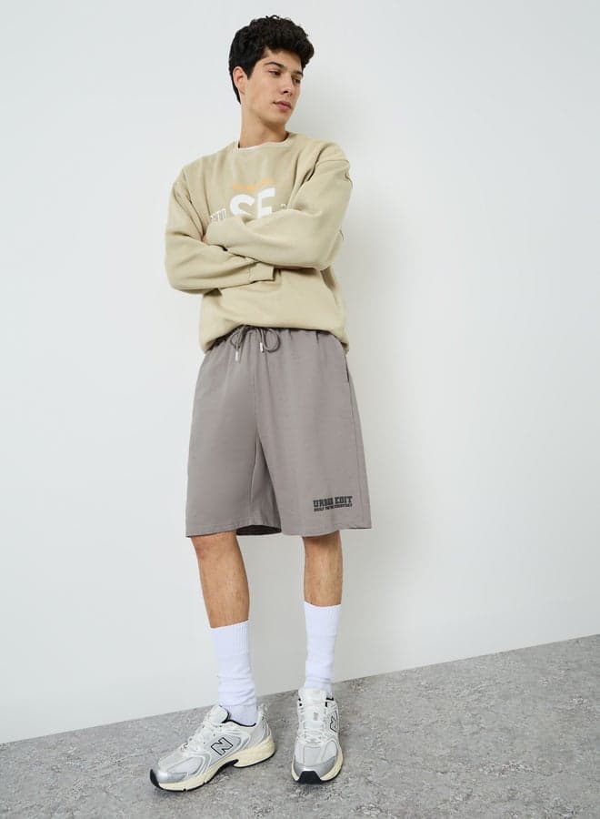 Men Charcoal Placement Print Oversized Shorts