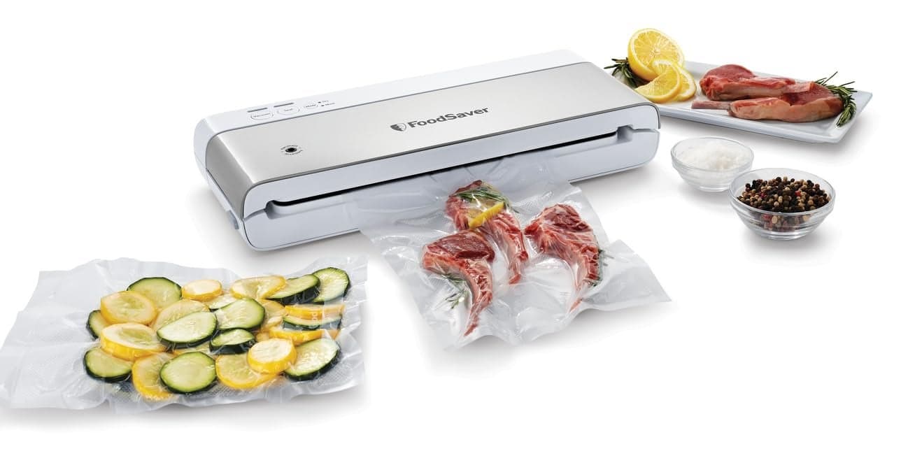 FoodSaver Compact Vacuum Sealer Machine with Airtight Bags and Roll Ideal for Sous Vide and Airtight Food Storage White
