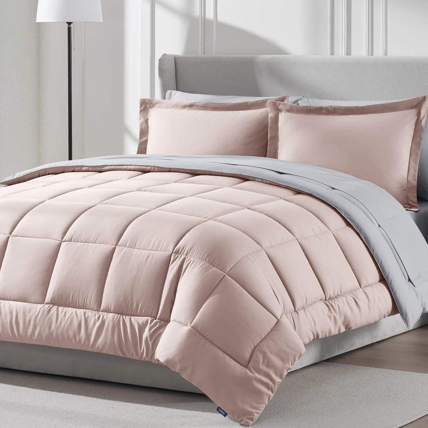 Nestl 7 Piece Queen Comforter Set Blush Pink Reversible Bed in a Bag Complete Queen Size Bedding Set with Sheets Pillowcases and Shams