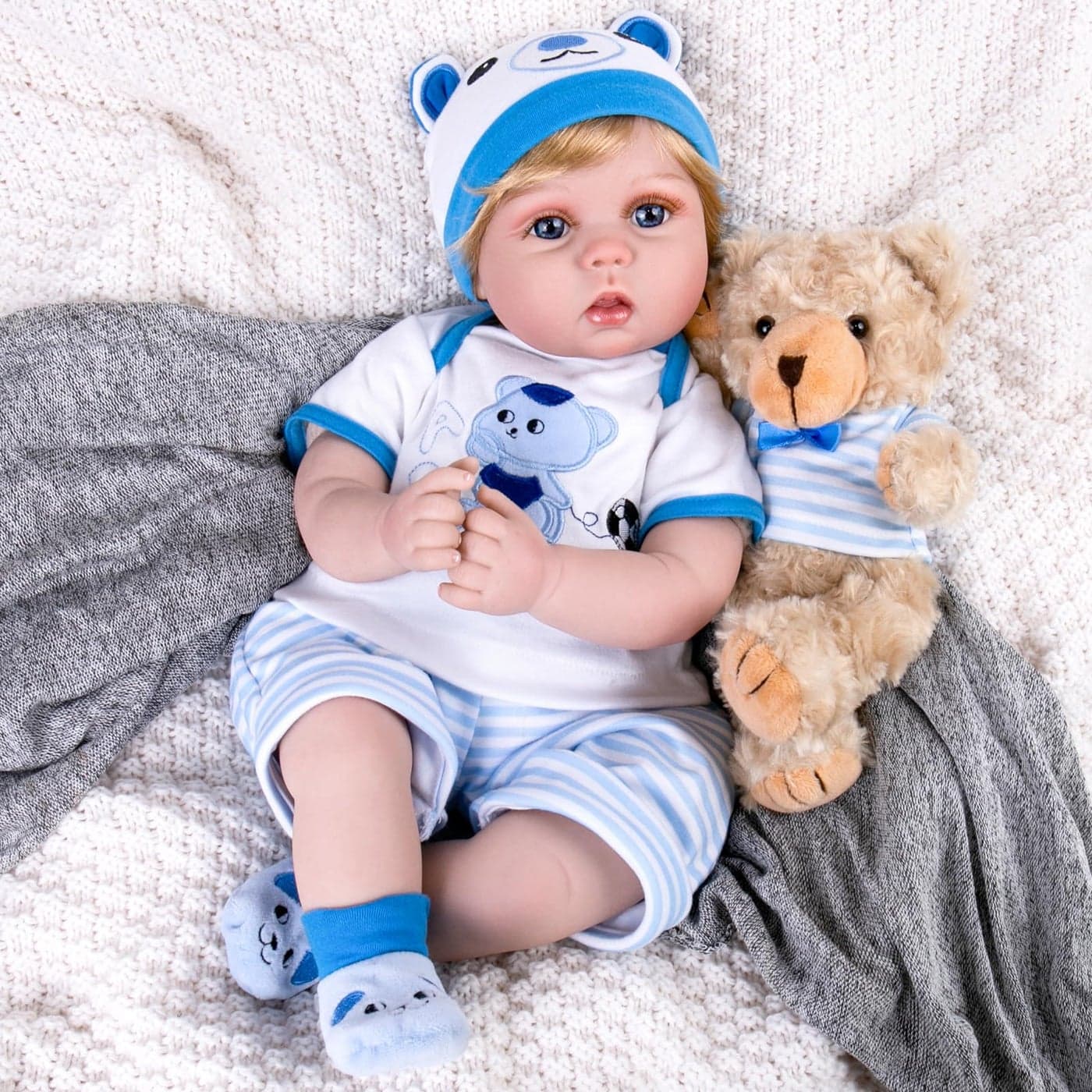 Aori Reborn Baby Boy Doll 22 Inch Lifelike Realistic Newborn Handmade Weighted Baby Dolls with Soft Cloth Body Cuddly Reborn Toddler for Kids 3 Realistic Boy Doll Gift Set