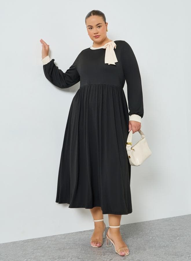 Plus Size Black A-Line Maxi Dress with Bow Detail — 24