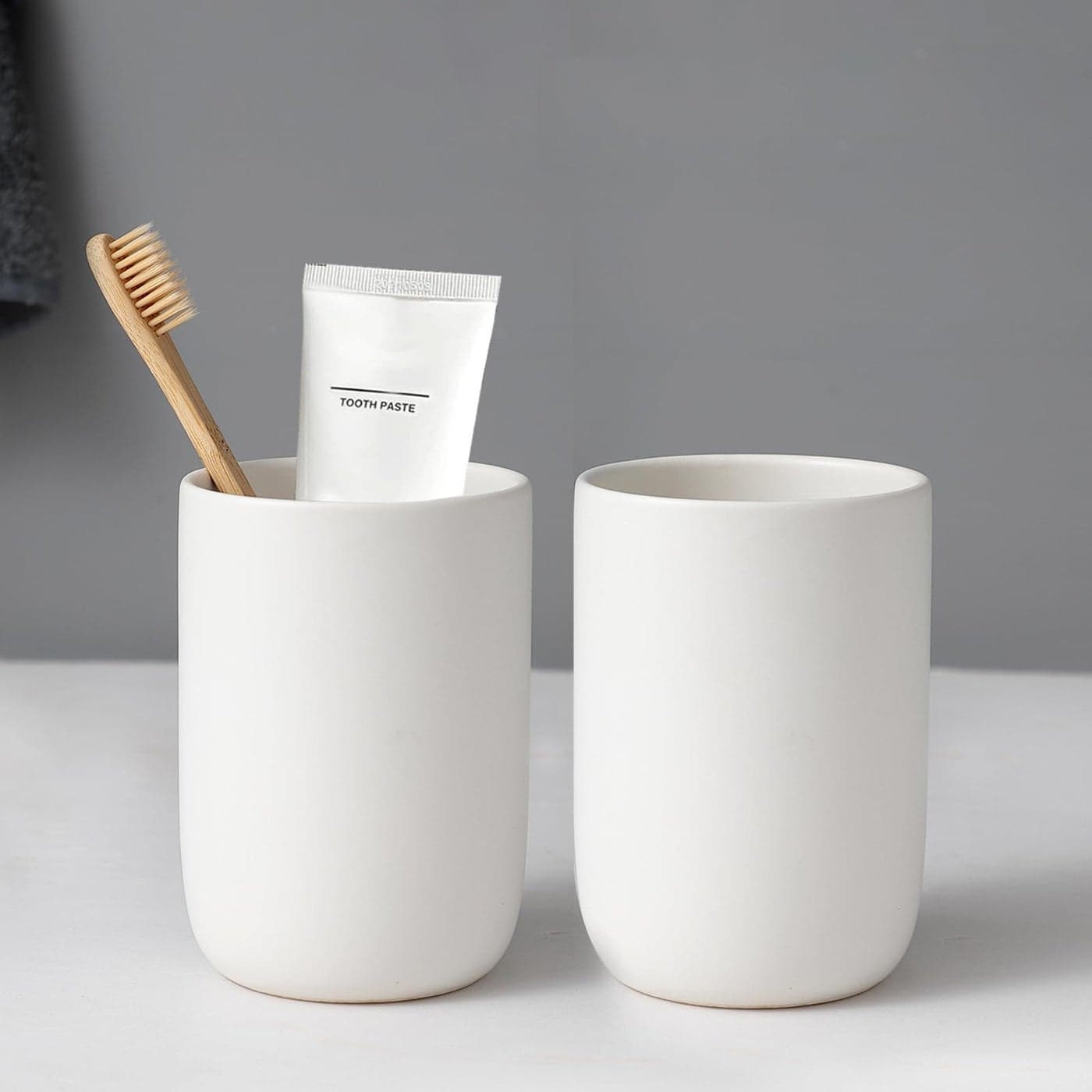 BSDISP Toothbrush Holders for Bathrooms 2 Cups Ceramic Toothbrush Toothpaste Holders Set White Bathroom Tumbler Cups Reusable Toothbrush Mouthwash Cup Bathroom Counter Organizer