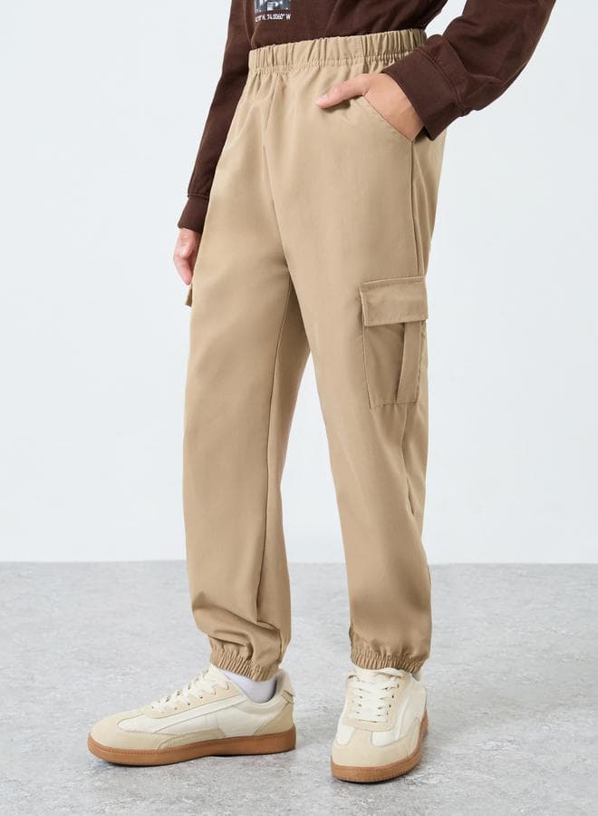 Kids Beige Solid Joggers — 9-10 YRS