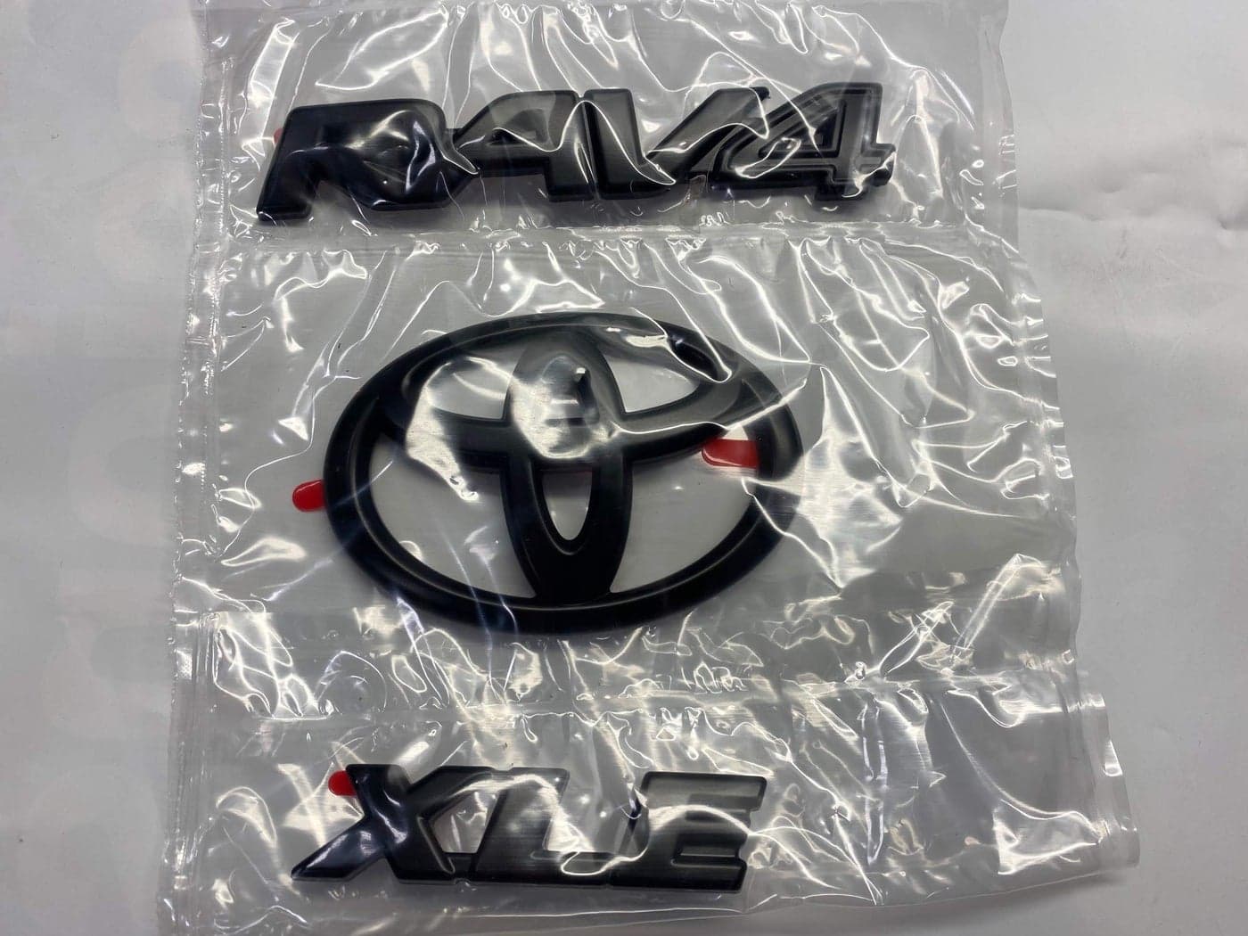 Genuine Toyota RAV4 XLE Blackout Black Emblem Overlays PT9484219202