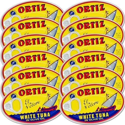Ortiz White Tuna in Olive Oil Fresh Tender Slices Spanish Wild Caught Tuna High in Protein and Omega 3 Fats Excellent in Salad Pasta or Sandwiches No Need to Add Mayo 395oz Can Pack of 12