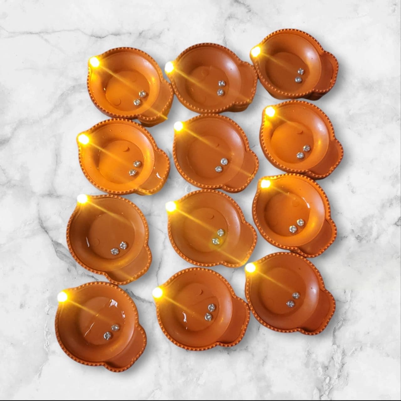 OTISTORES Water Diyas for Diwali Diyas Lights for Decoration Traditional Water Sensor Flameless LED Candles Diyas LED Diyas Candle with Water Sensing Technology for DiwaliPack of 12