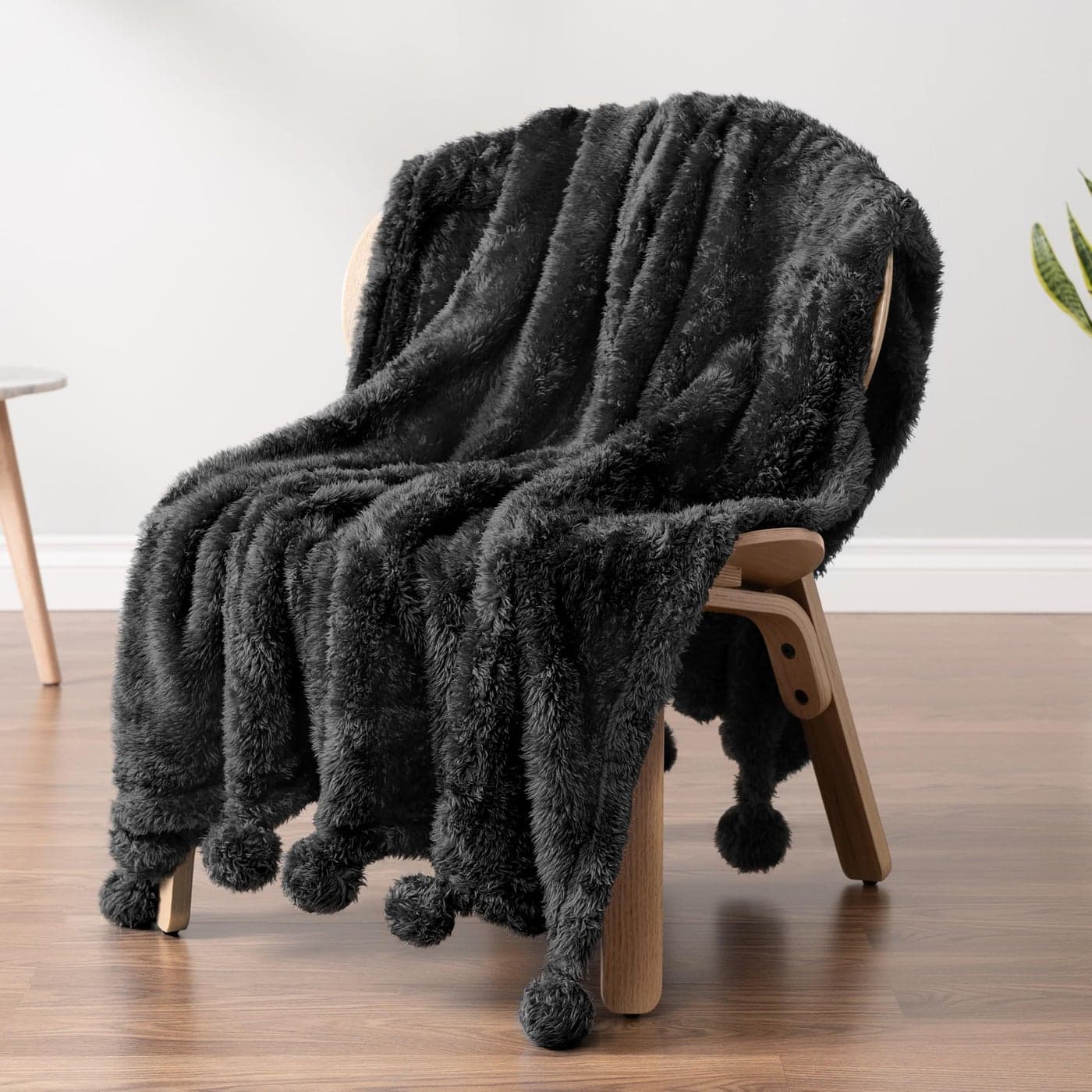 PAVILIA Black Sherpa Throw Blanket for Couch Warm Plush Pom Pom Throw Fuzzy Sofa Blanket Lightweight Soft Cozy Fluffy With Pom Poms 50x60
