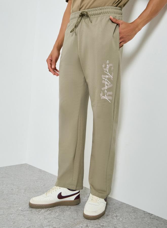 Men Green Graphic Print Relaxed Joggers