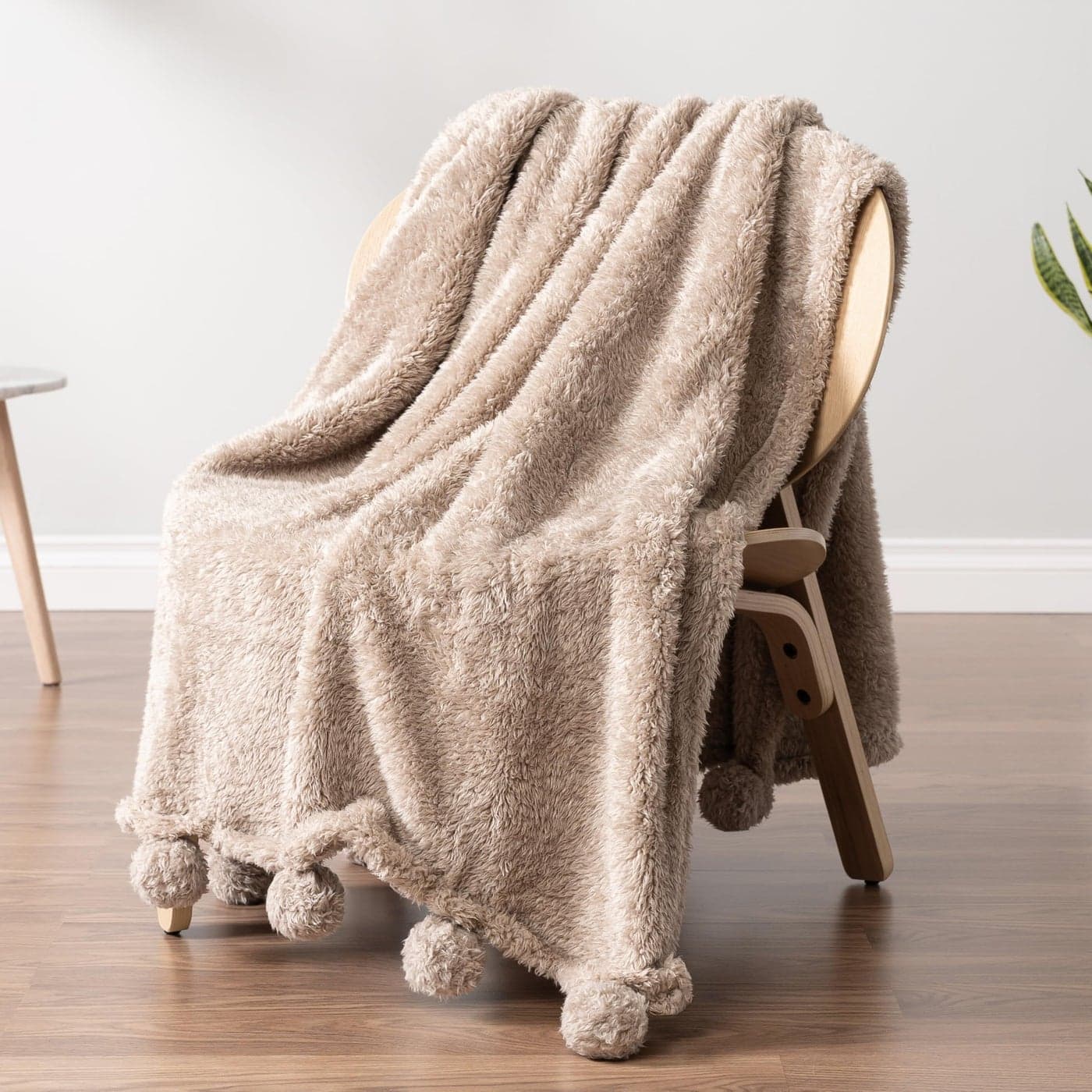 PAVILIA Taupe Sherpa Throw Blanket for Couch Warm Plush Pom Pom Blanket Throw Tan Fuzzy Sofa Throw Lightweight Soft Cozy Fluffy Blanket with Pom Poms Light Brown 50x60
